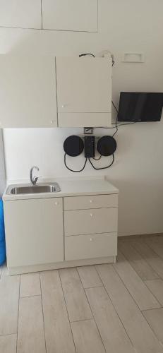 Kuchyň nebo kuchyňský kout v ubytování Residenza Baffra