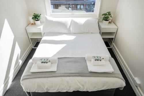 Cama o camas de una habitación en Bar Broadway