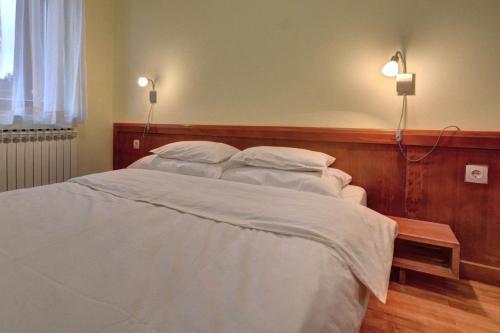 Postel nebo postele na pokoji v ubytování Poljice centar