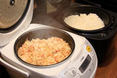 a pan of rice on top of a toaster oven at Richmond Hotel Fukushima Ekimae in Fukushima
