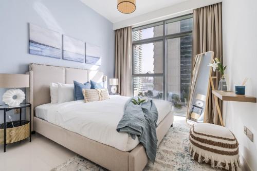 Katil atau katil-katil dalam bilik di GuestReady - Lush Apt overlooking The Palm