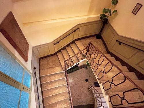 an overhead view of a staircase in a building at Residenza Studio delle Arti in Bologna