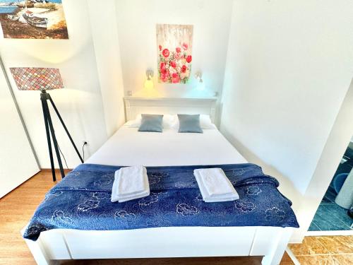 Cama o camas de una habitación en FOR-A Apartmani