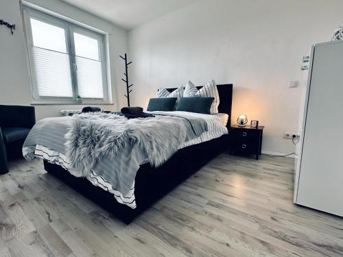Postel nebo postele na pokoji v ubytování FeWo Euregio Terrasse & Klinik-Nähe