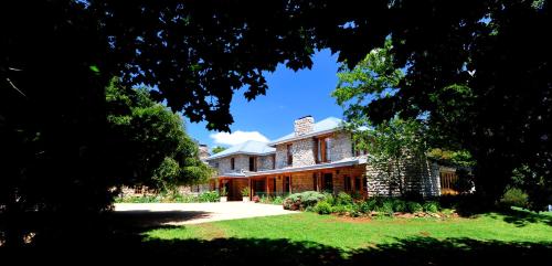 Κήπος έξω από το The FarSide Country Manor