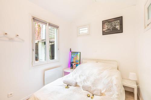Photo de la galerie de l'établissement GuestReady - Appart. confortable avec jardin privé, aux Lilas