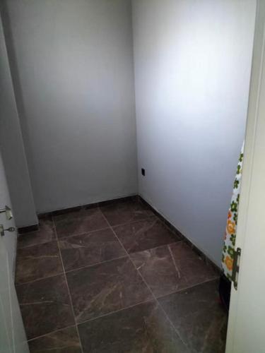 a room with a white door and a tile floor at Liz Villa in Ortaca