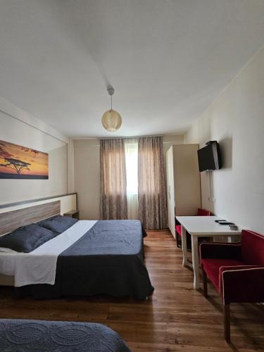 A bed or beds in a room at Hotel 045