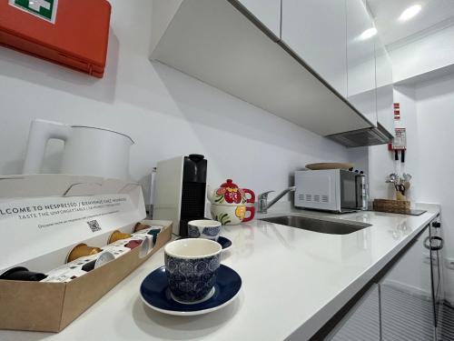 Kuchyň nebo kuchyňský kout v ubytování A casa da Tia Júlia