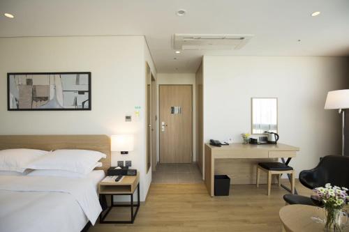 Postelja oz. postelje v sobi nastanitve Best Western Haeundae Hotel