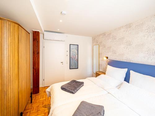 Ένα ή περισσότερα κρεβάτια σε δωμάτιο στο Apartments am Linggplatz