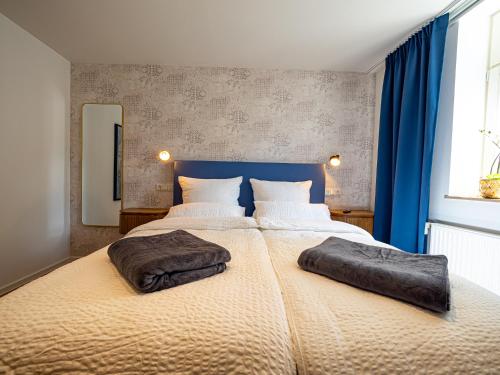 Ένα ή περισσότερα κρεβάτια σε δωμάτιο στο Apartments am Linggplatz