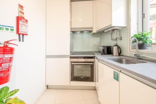 Η κουζίνα ή μικρή κουζίνα στο GuestReady - Modern and cosy apartment