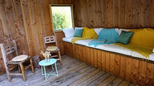 Χώρος καθιστικού στο Cabane en bois climatisée