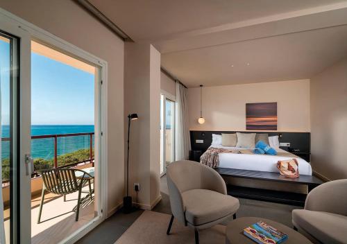 Postel nebo postele na pokoji v ubytování AQUA Hotel Promenade & Spa 4Sup