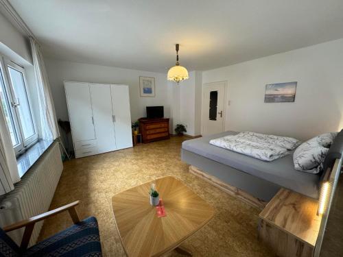 Кровать или кровати в номере Van Kim 1 Ferienwohnung