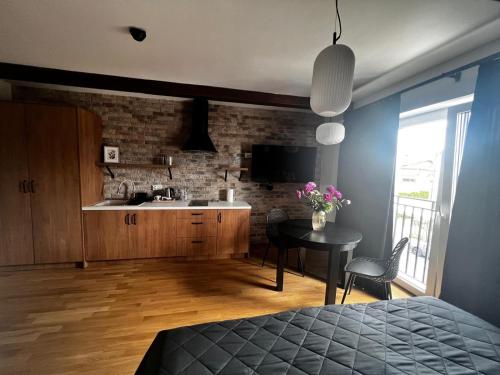 Kuchyň nebo kuchyňský kout v ubytování Apartamenty Św Stanisława
