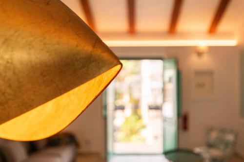 a close up of a table with a refrigerator at Casa Esmeralda - Luxury Boutique Apartments Old Town in Estepona
