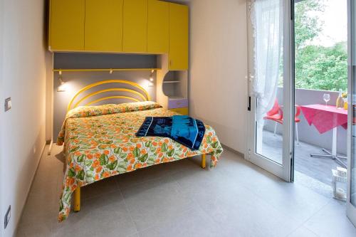 Postel nebo postele na pokoji v ubytování Residence La Pigna