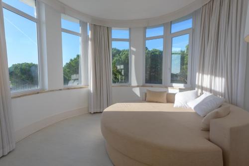 Χώρος καθιστικού στο Amazonia Estoril Hotel