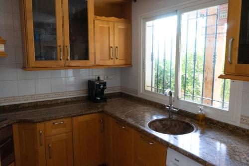 Kuchyň nebo kuchyňský kout v ubytování La casa de Lidia