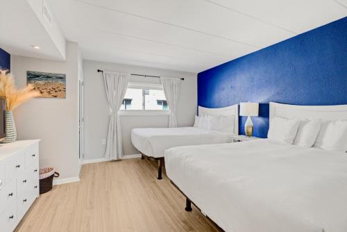 Postel nebo postele na pokoji v ubytování Desert Sand Resort