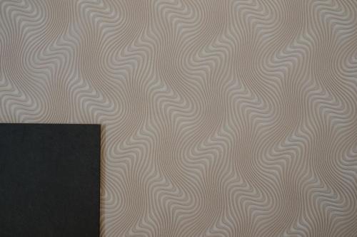 a wall with wavy lines on it at Marcone Luxury Rooms - Il giardino di pietra in Trani