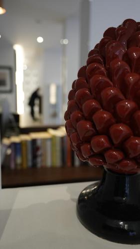 a vase filled with a bunch of chocolate balls at Splendid Hotel Taormina in Taormina