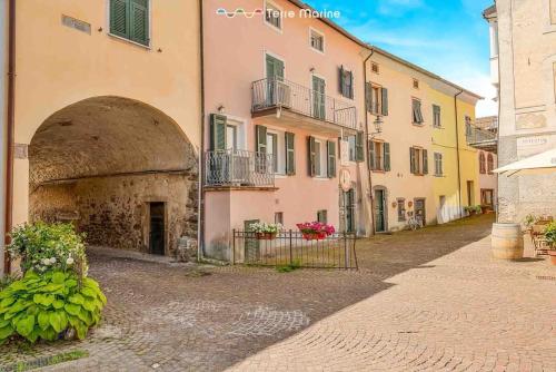 an alley in a town with a building at Pietra Futura, TerreMarine in Pignone