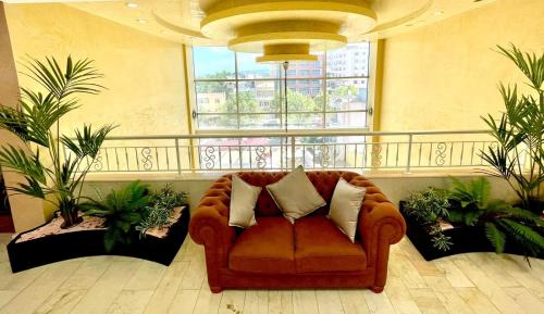 Zona de estar de AMH Hotel Durres