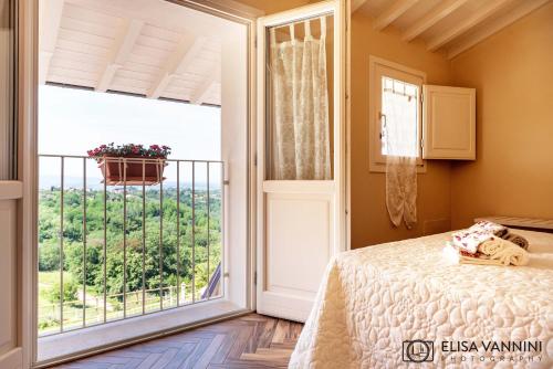 Ένα ή περισσότερα κρεβάτια σε δωμάτιο στο Villa La Gemma