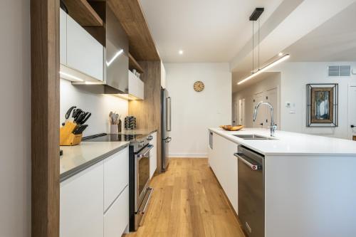 Køkken eller tekøkken på Tremblant Prestige - Verbier 13-102