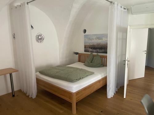 Posteľ alebo postele v izbe v ubytovaní Ferienhaus beim Turm