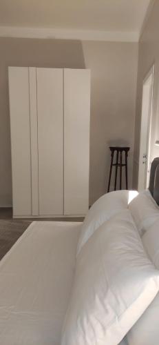 Postel nebo postele na pokoji v ubytování Il Cortile di Mabe