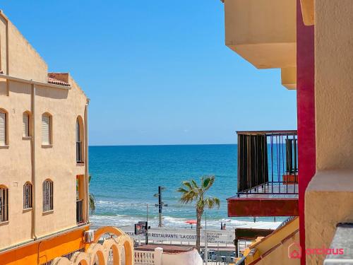 a view of the beach from a building at La Finca in Oropesa del Mar