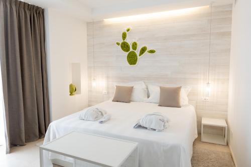Letto o letti in una camera di San Lorenzo Boutique Hotel & SPA