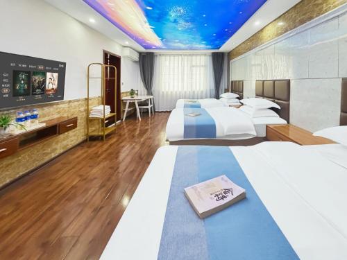 Cama o camas de una habitación en Yijingju Humanistic Inn