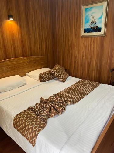 Postel nebo postele na pokoji v ubytování New Happy inn