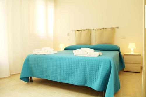Ένα ή περισσότερα κρεβάτια σε δωμάτιο στο Casa A Riba U Mari