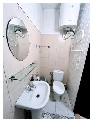 Ванная комната в Ievos Kalno apartamentai III