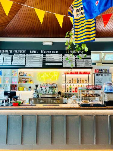 a view of a food counter in a restaurant at ZAPPI CYCLING HOTEL in Riolo Terme