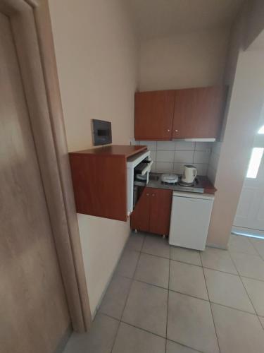 Η κουζίνα ή μικρή κουζίνα στο PAVLOS ROOMS
