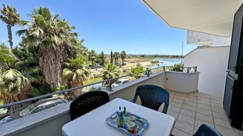 A balcony or terrace at Appartamento LUNGOLAGO by Salento Affitti