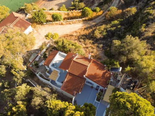 an overhead view of a house with orange roof at Villas Maher Two in Vasilítsion