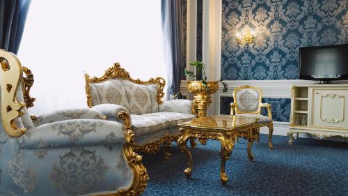 TV a/nebo společenská místnost v ubytování Hotel Monet - Das Kunsthotel an der Lahn