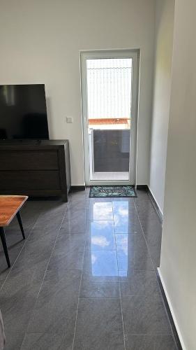 Μια τηλεόραση ή/και κέντρο ψυχαγωγίας στο Haus im Grünen - App OG