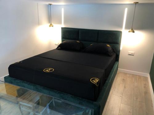 Postel nebo postele na pokoji v ubytování Rent Room 5 Rolandi Apartaments