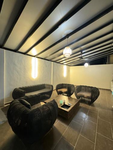 Ruang duduk di Homestay Pool Villa Andora