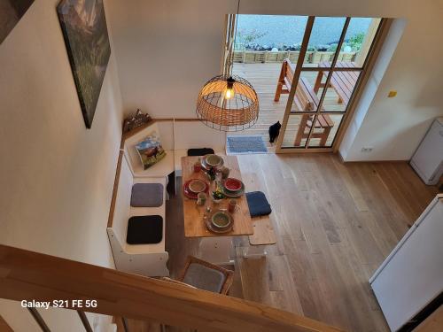 an overhead view of a living room with a table at Ferienhof Müller Vorderburg in Vorderburg