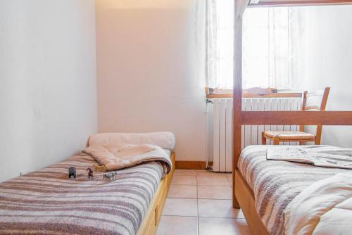 Ein Bett oder Betten in einem Zimmer der Unterkunft Gîte Gîte Goulet 2/4 personnes